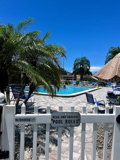 1701 Pinehurst Road, Unit 13C Dunedin, FL 34698 - Photo 27 of 28 a view of an outdoor space