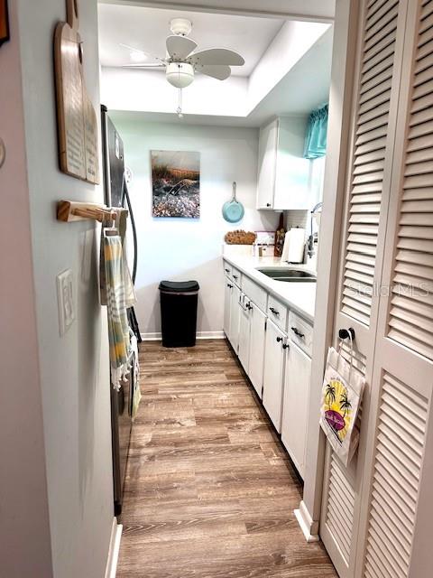 1701 Pinehurst Road, Unit 13C Dunedin, FL 34698 - Photo 5 of 28 a bathroom with a sink a mirror and a shower