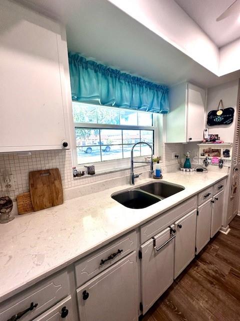 1701 Pinehurst Road, Unit 13C Dunedin, FL 34698 - Photo 6 of 28 a kitchen with stainless steel appliances a sink a stove and a wooden cabinets
