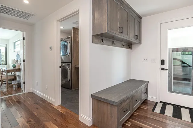a spacious bathroom with a double vanity sink mirror and double
