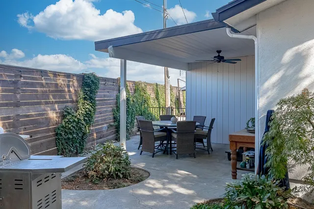 a view of a porch with seating space