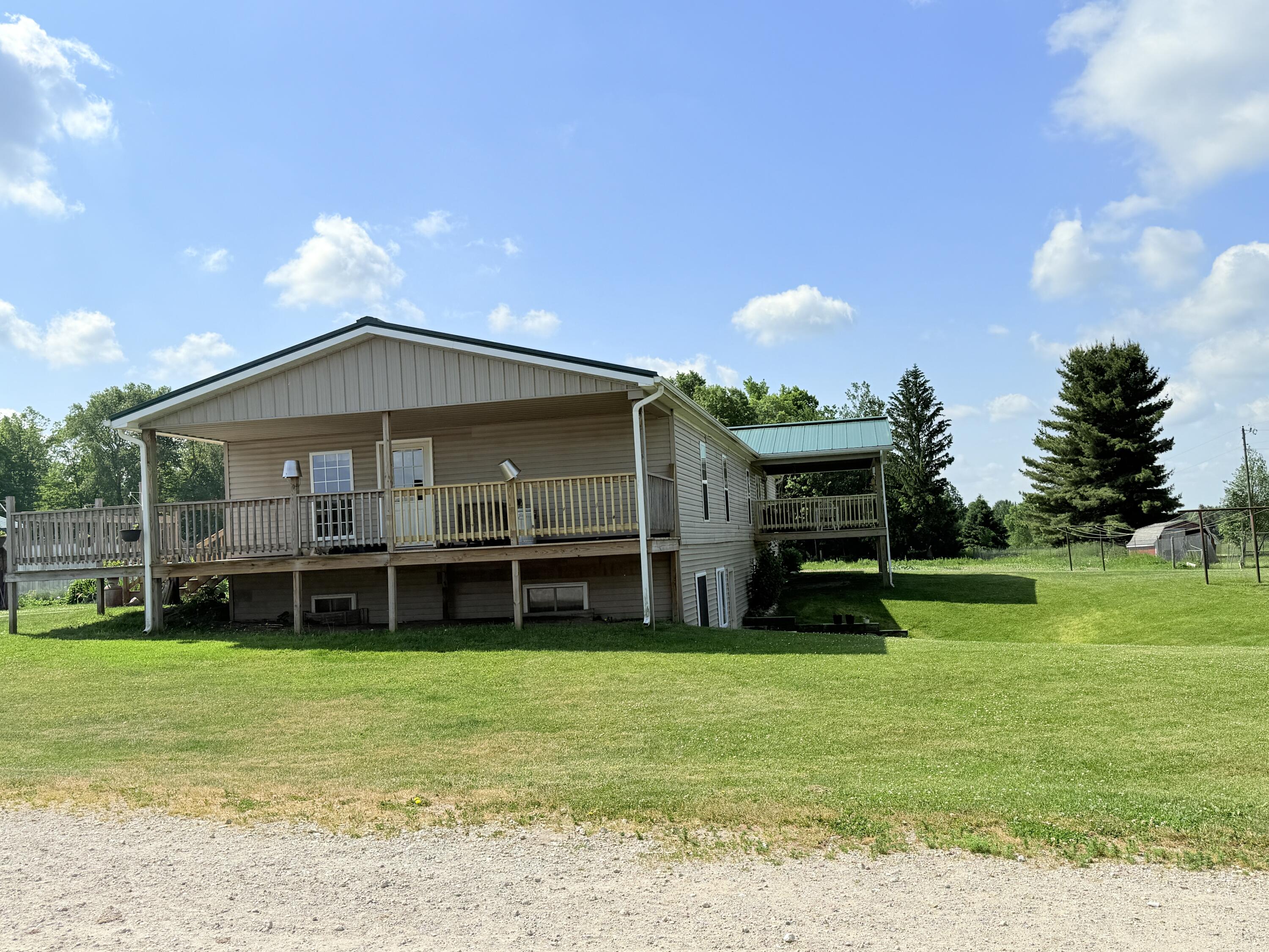 21576 Patterson Road, Unit OPTION B Tustin, MI 49688 - Photo 4 of 13 IMG_0825