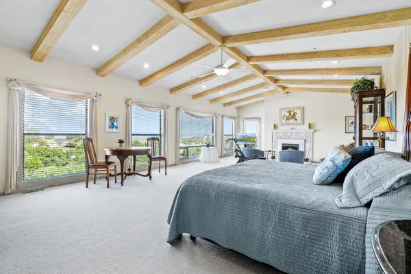 a bedroom with furniture and a bed