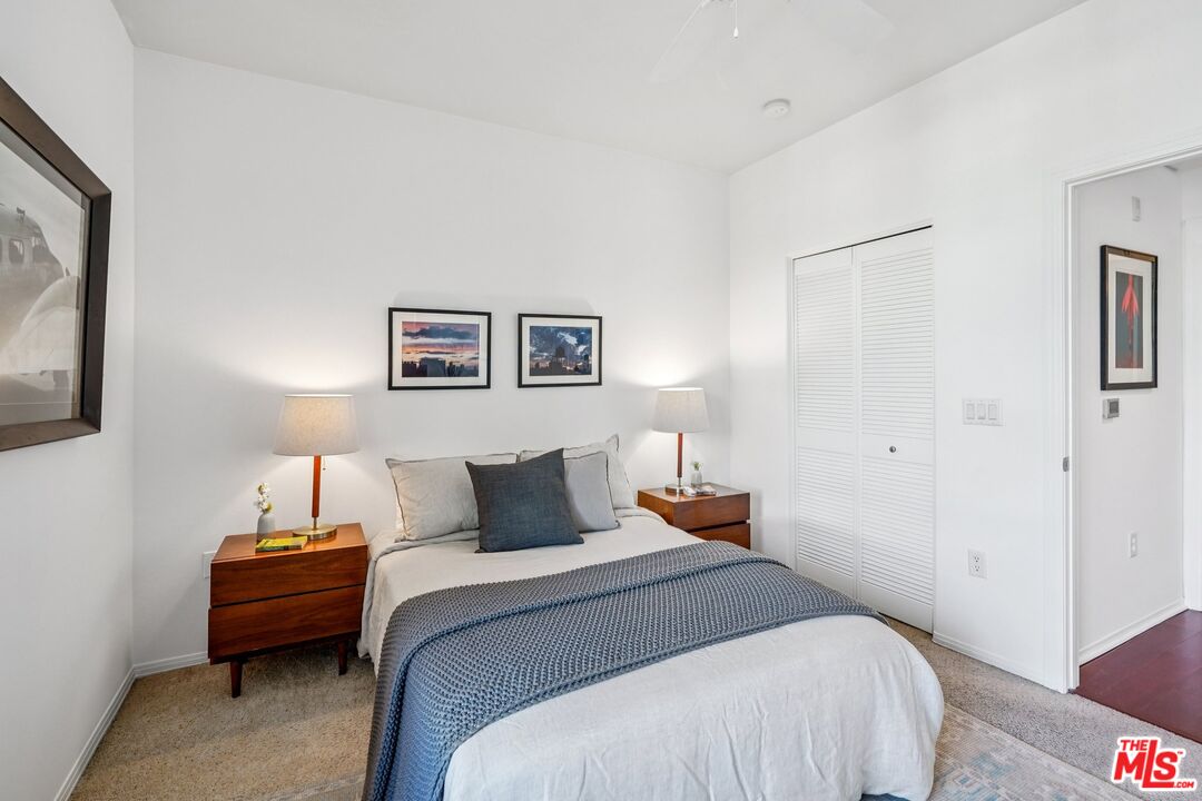 100 South Alameda Street, Unit 477 Los Angeles, CA 90012 - Photo 10 of 24 a bedroom with bed and a window