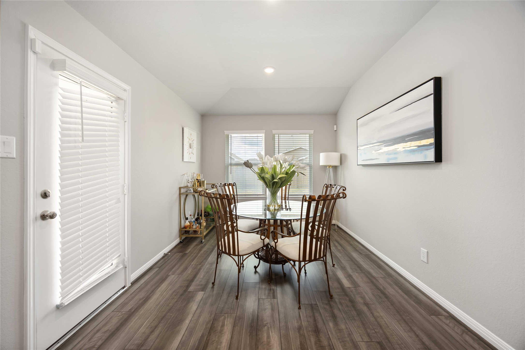 6910 Lebec Drive Rosharon, TX 77583 - Photo 15 of 26 a view of a dining room with furniture and wooden floor