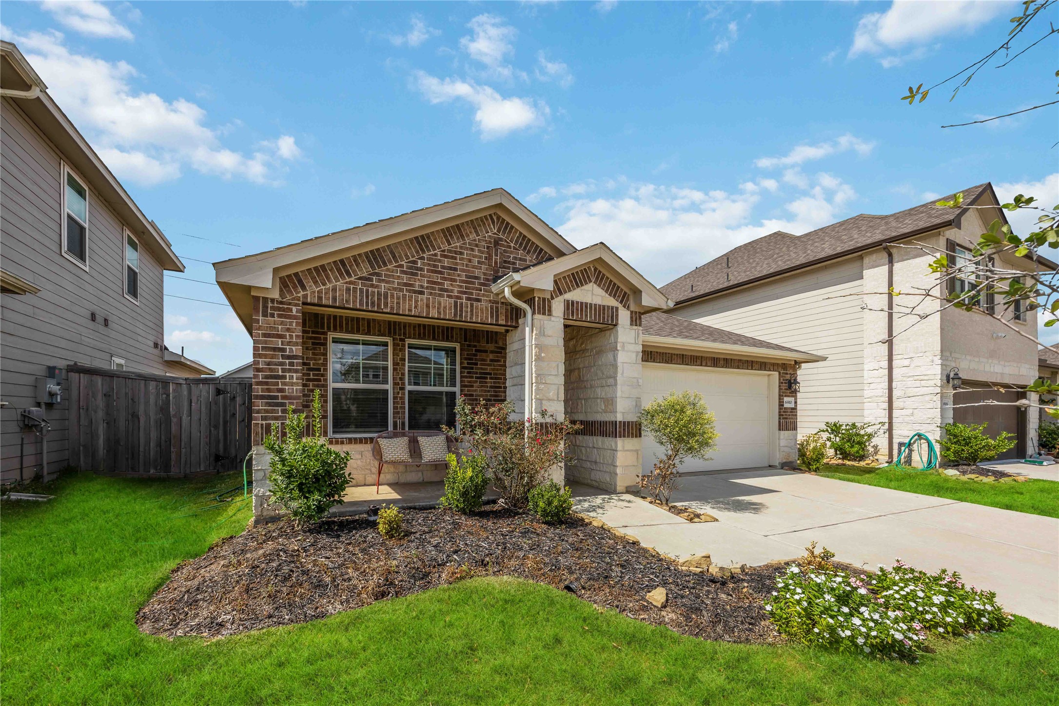 6910 Lebec Drive Rosharon, TX 77583 - Photo 2 of 26 a view of a house with a yard and plants