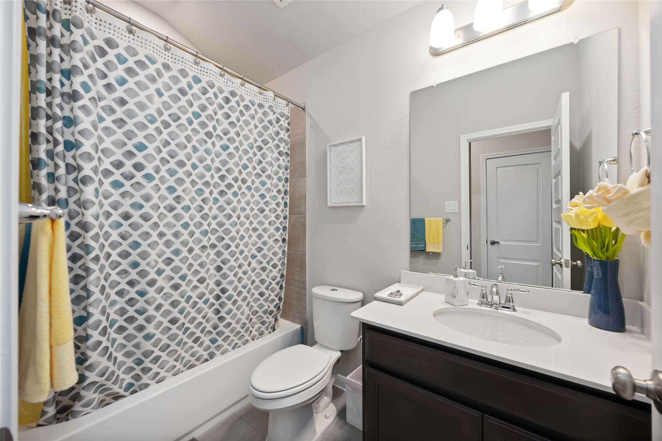6910 Lebec Drive Rosharon, TX 77583 - Photo 22 of 26 a bathroom with a sink toilet and shower