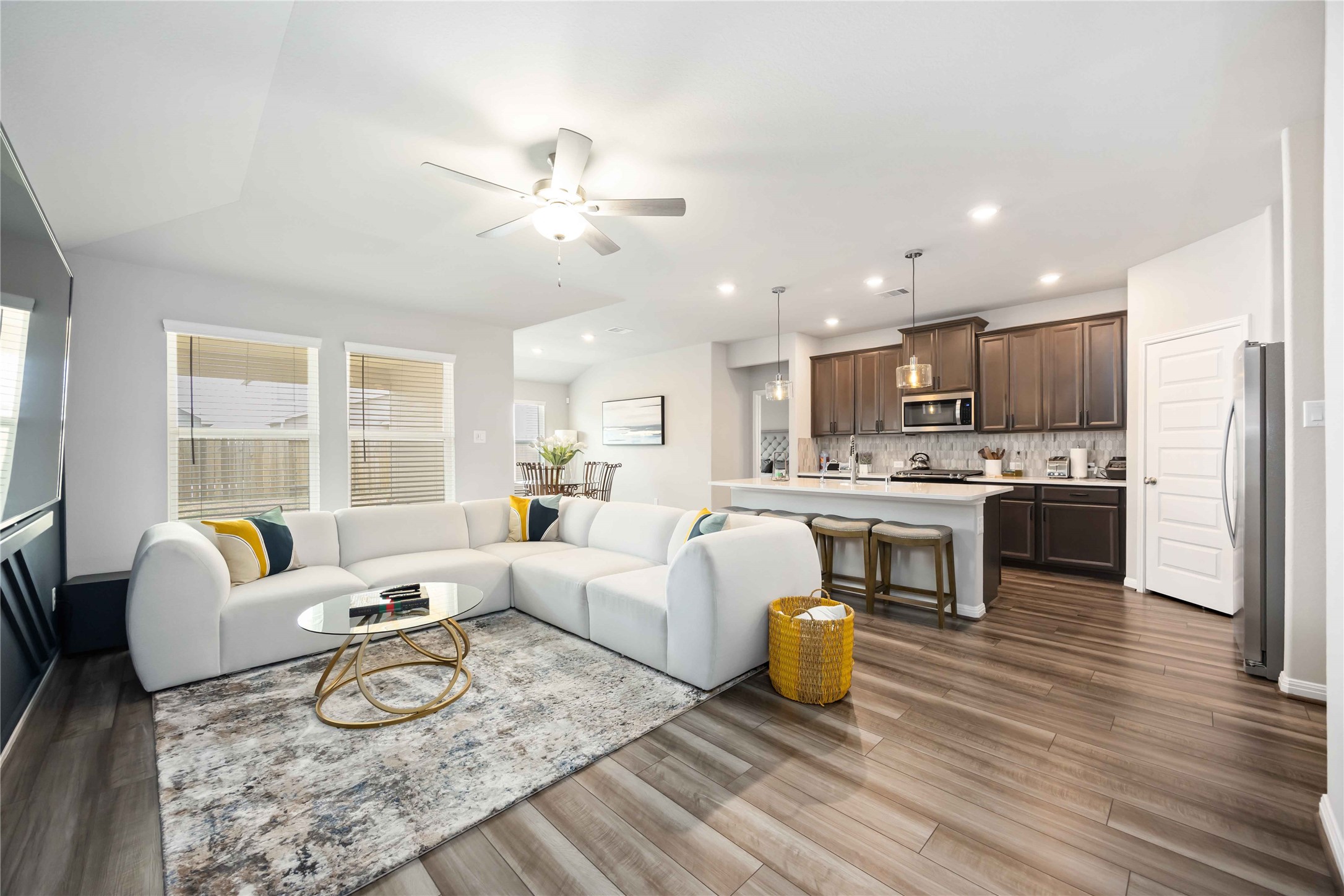 6910 Lebec Drive Rosharon, TX 77583 - Photo 8 of 26 a living room with furniture and kitchen view
