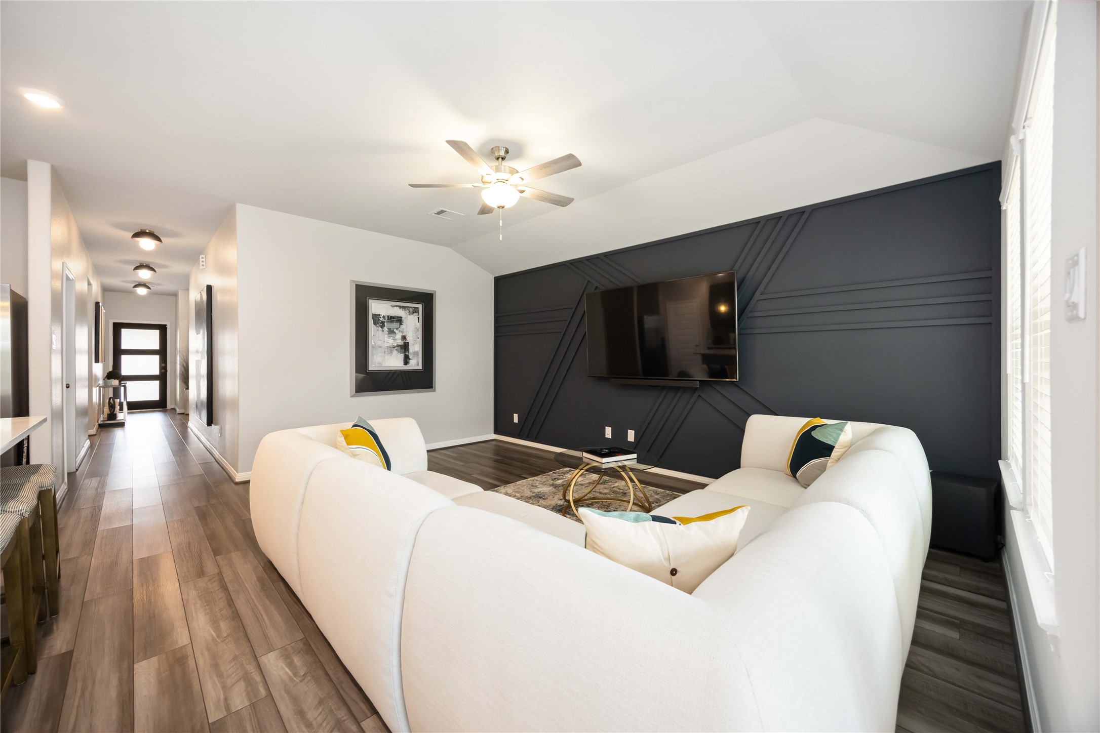 6910 Lebec Drive Rosharon, TX 77583 - Photo 9 of 26 a living room with furniture and a flat screen tv