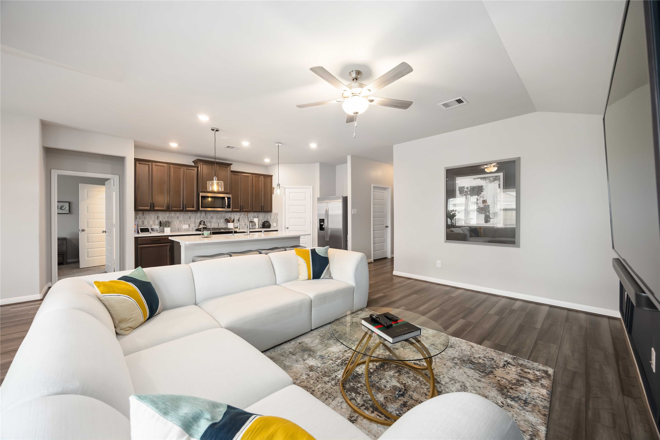6910 Lebec Drive Rosharon, TX 77583 - Photo 10 of 26 a living room with furniture and kitchen view