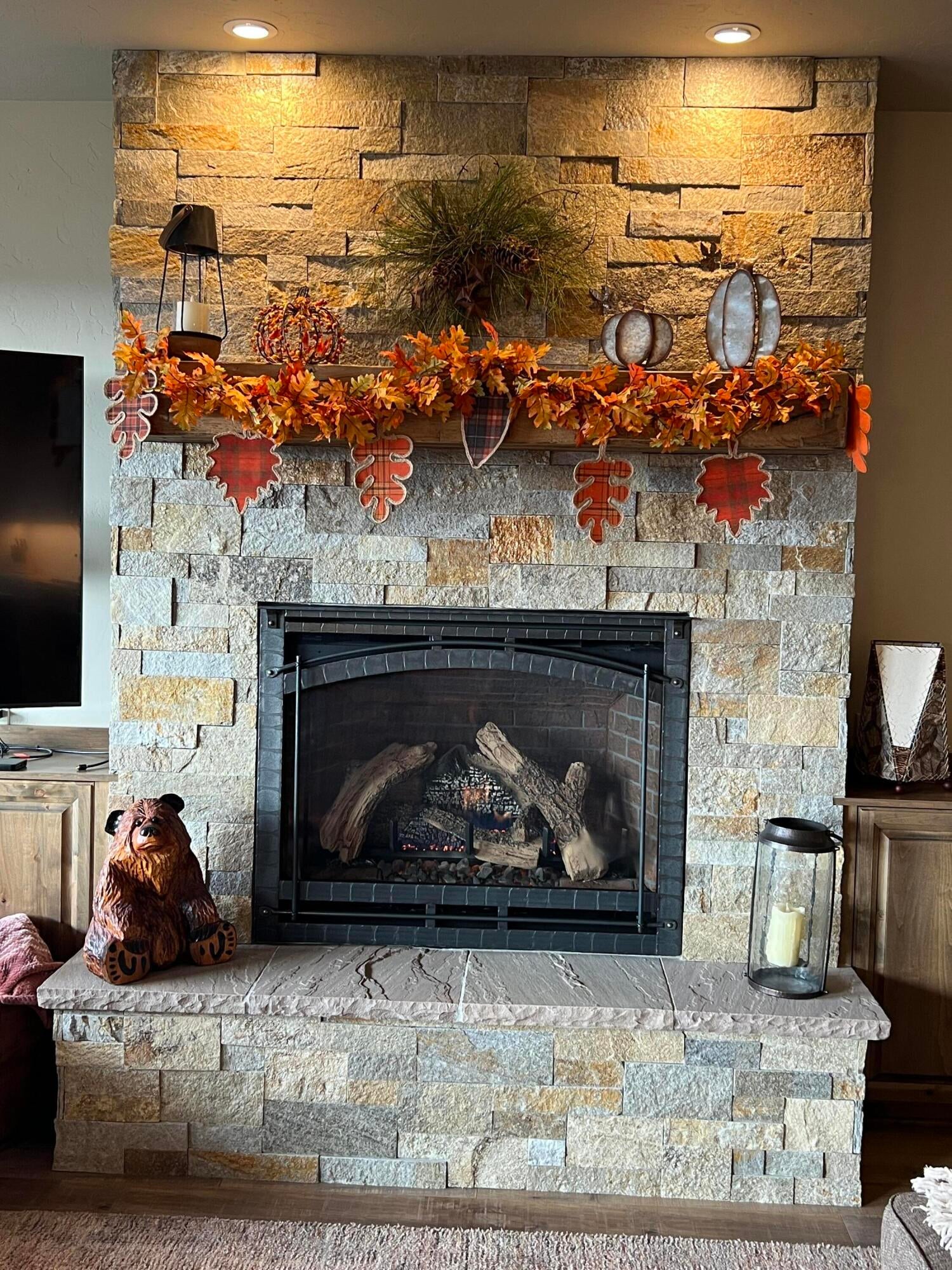 3405 Southwest 45th Street Redmond, OR 97756 - Photo 57 of 76 Copper Ledge stone & a gas fireplace are the heart of the Great Room, look for new pictures