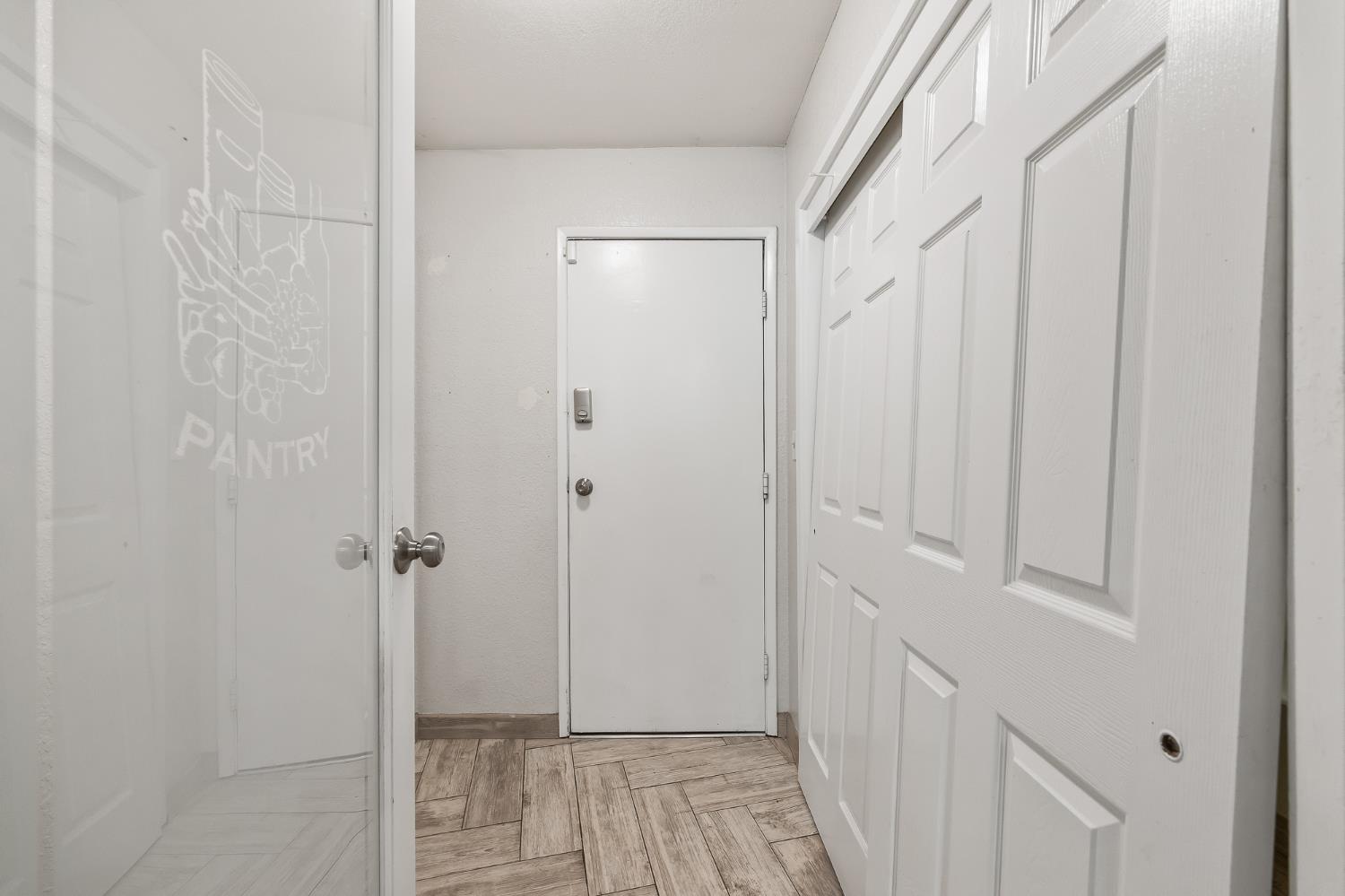 14944 Huntington Road Madera, CA 93636 - Photo 18 of 72 Pantry off kitchen and garage door entrance.
