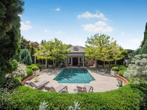 a view of a backyard with a garden