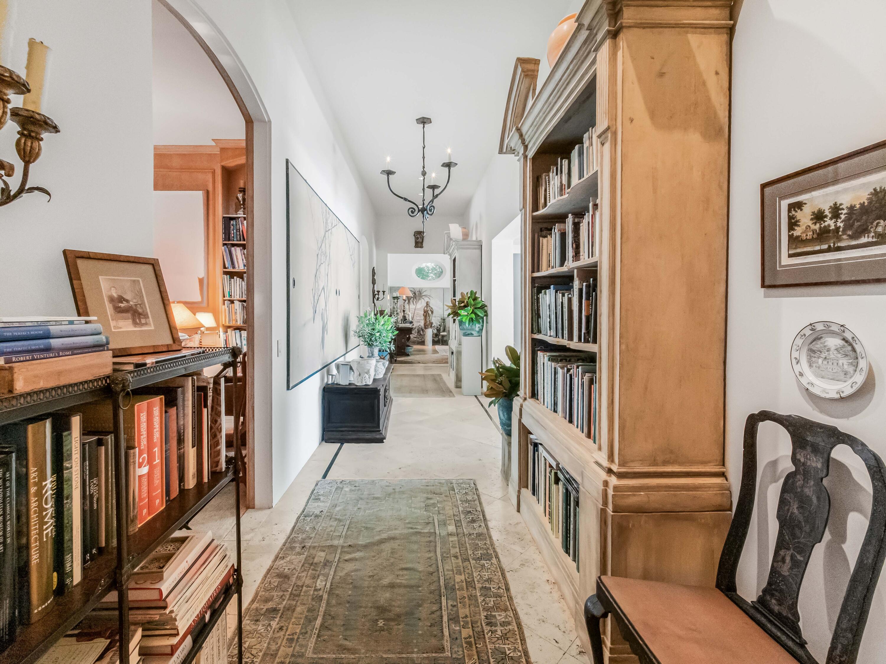 2072 China Flat Road Montecito, CA 93108 - Photo 12 of 41 a living room with furniture fireplace and baby crib