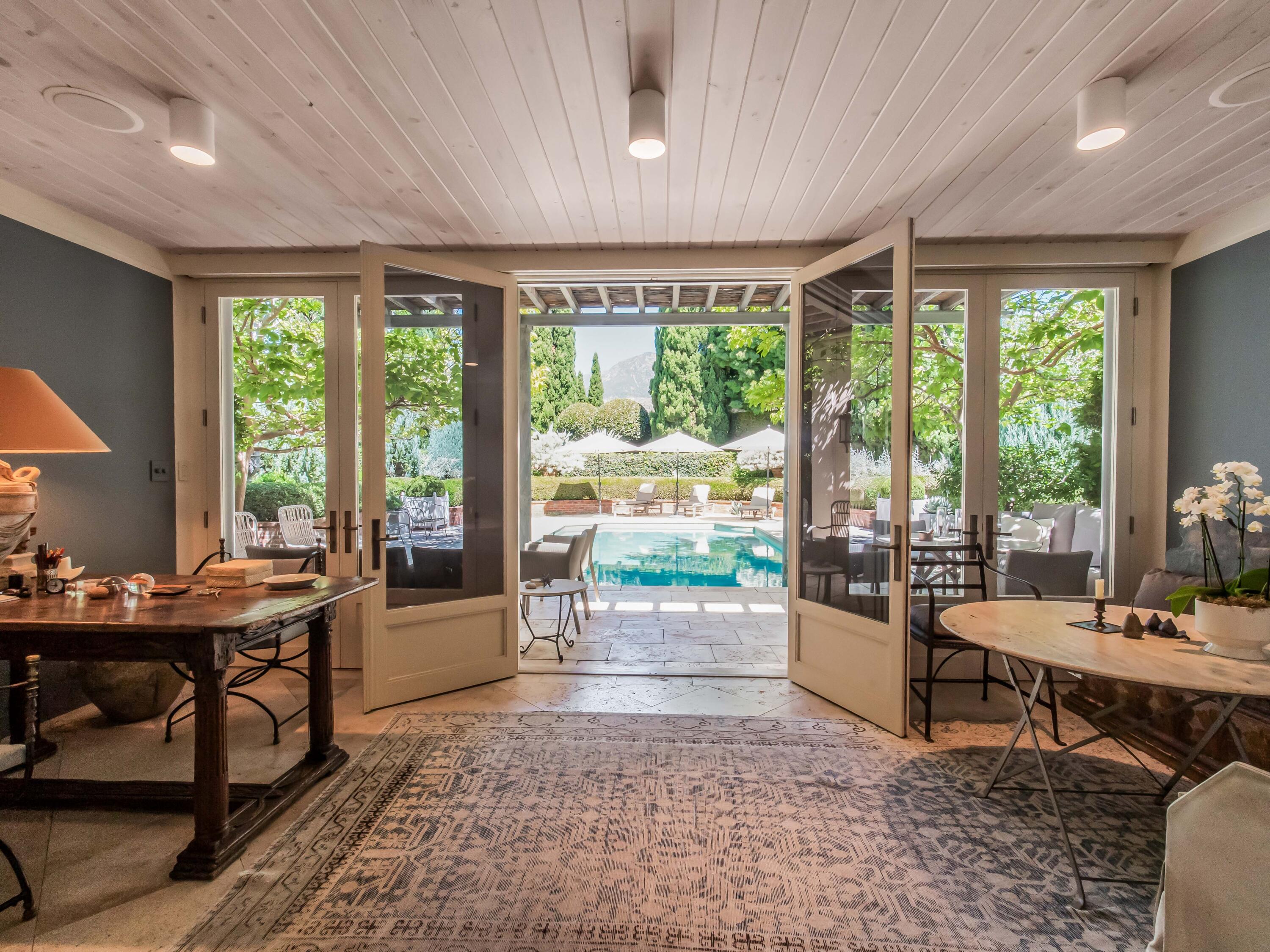 2072 China Flat Road Montecito, CA 93108 - Photo 13 of 41 a living room with furniture and a large window