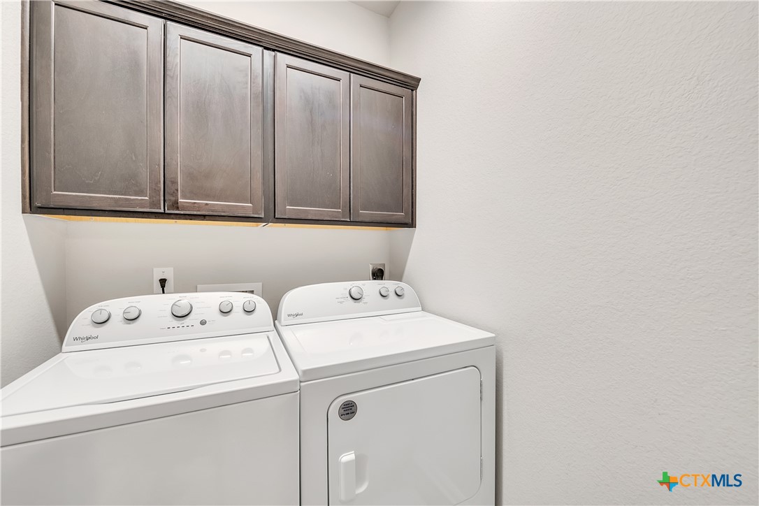 5010 Fallen Tree Drive Temple, TX 76502 - Photo 32 of 39 a utility room with dryer and washer