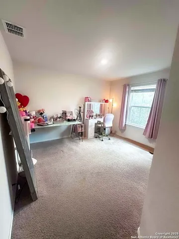 a room with furniture and a window