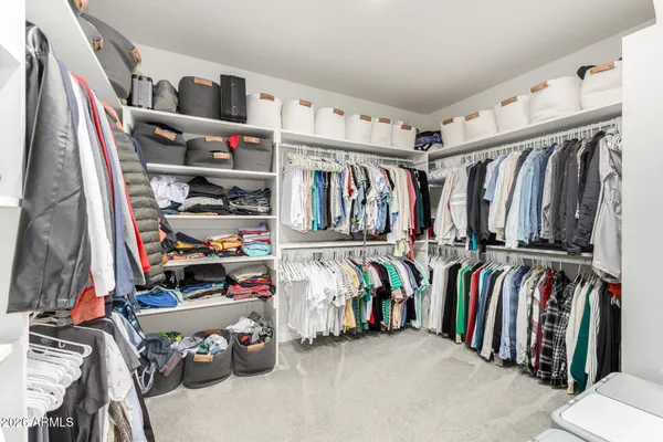 a bed room with a bed and a window