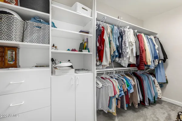 a bed room with a bed and a window