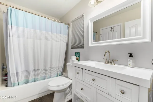 a view of a kitchen with washer and dryer