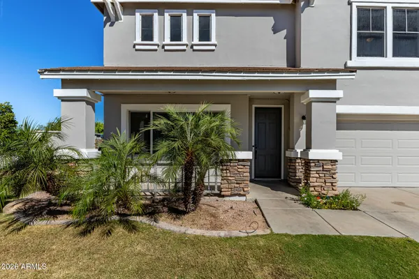 a workspace with furniture pool table and a wooden floor