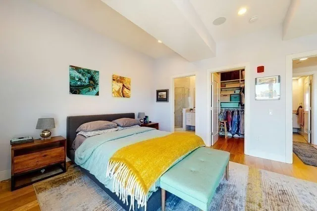 a bed room with a bed and a furniture