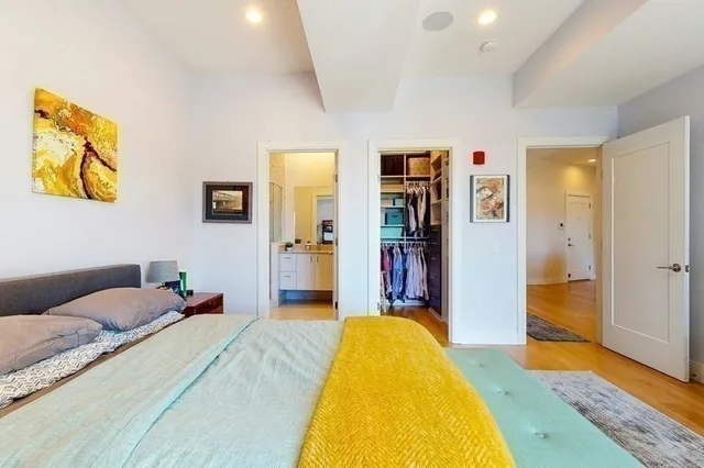 a living room with furniture rug and window