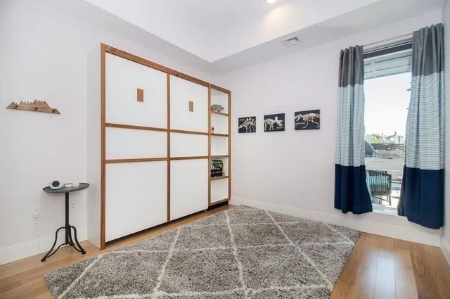 a view of a balcony with chairs