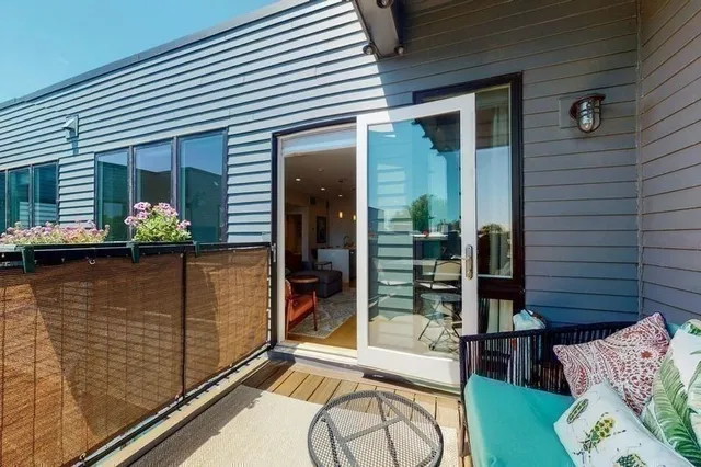 a view of a garage with parked cars