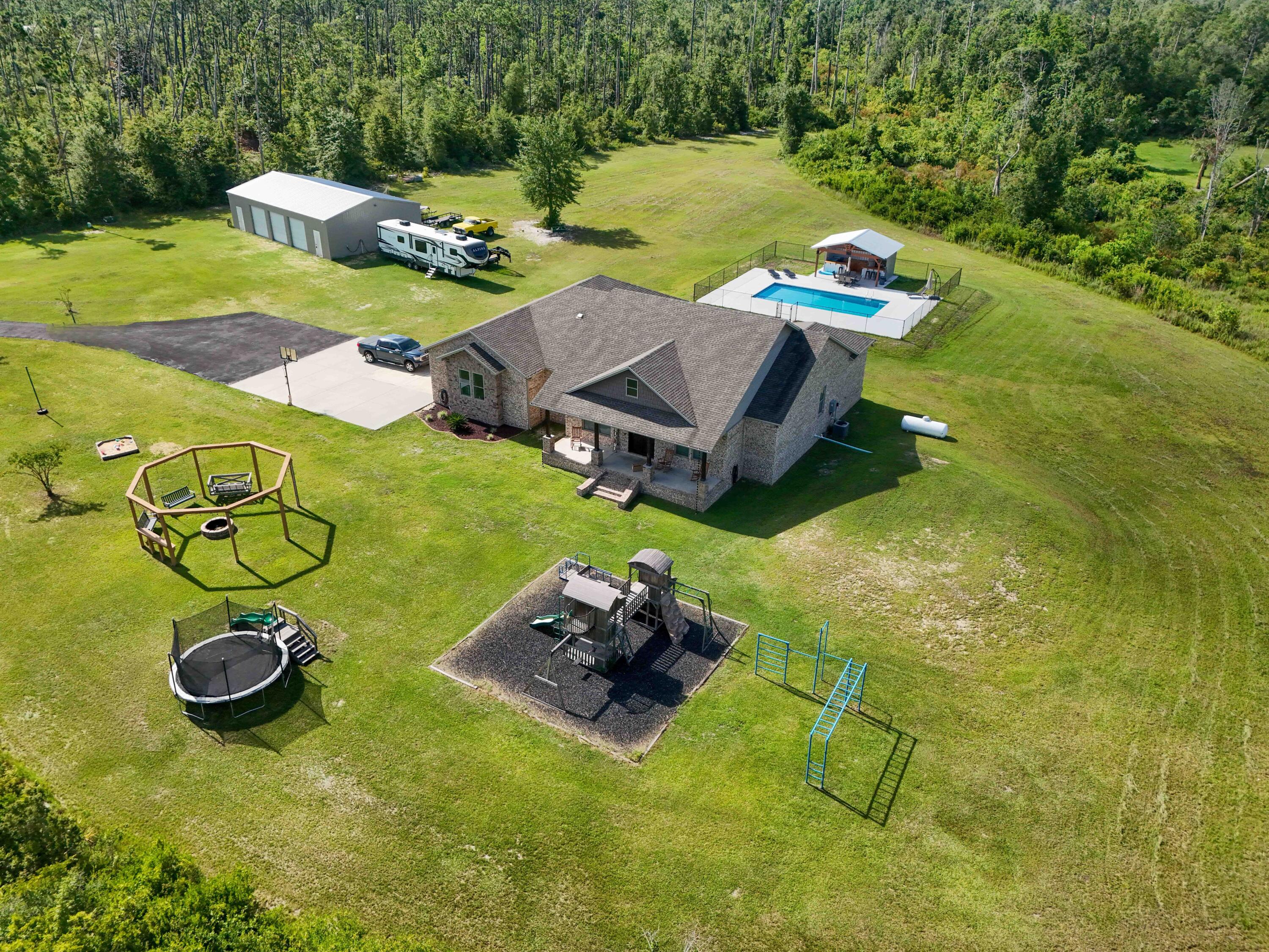 2750 Edwards Road Southport, FL 32409 - Photo 1 of 60 DJI_20240708092540_0004_D-Edit