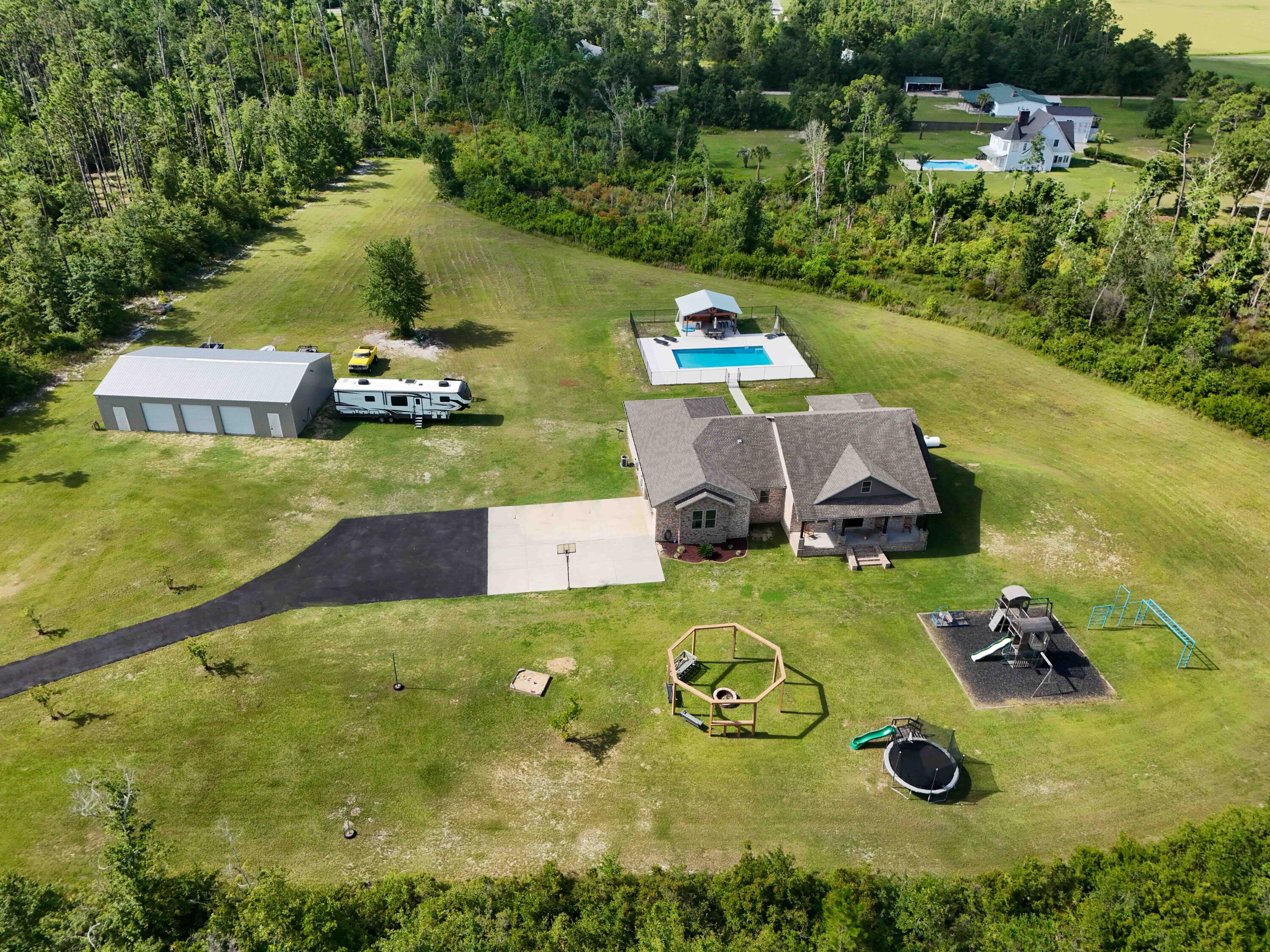 2750 Edwards Road Southport, FL 32409 - Photo 11 of 60 an aerial view of a house with outdoor space