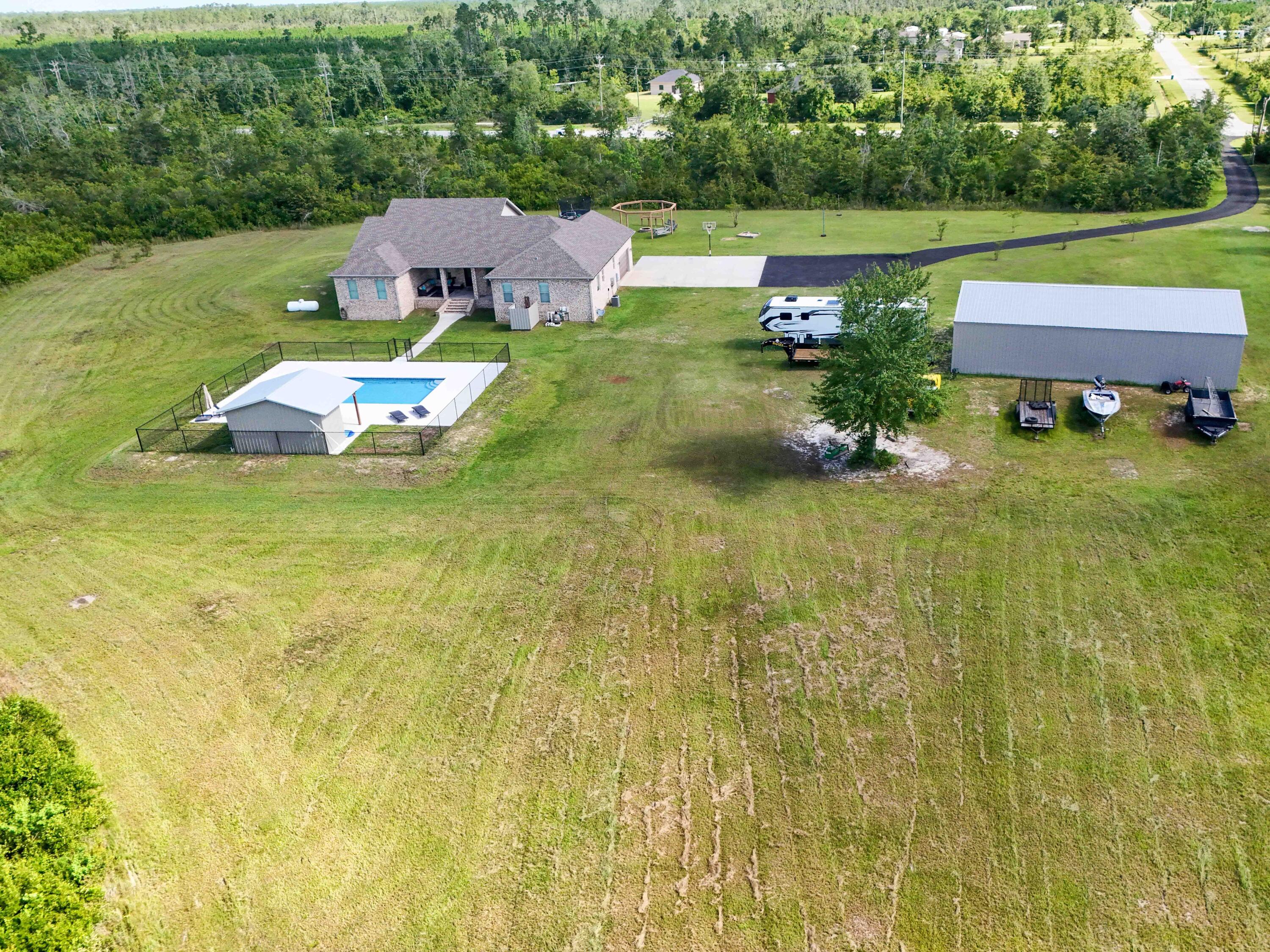 2750 Edwards Road Southport, FL 32409 - Photo 19 of 60 DJI_20240708093003_0022_D-Edit