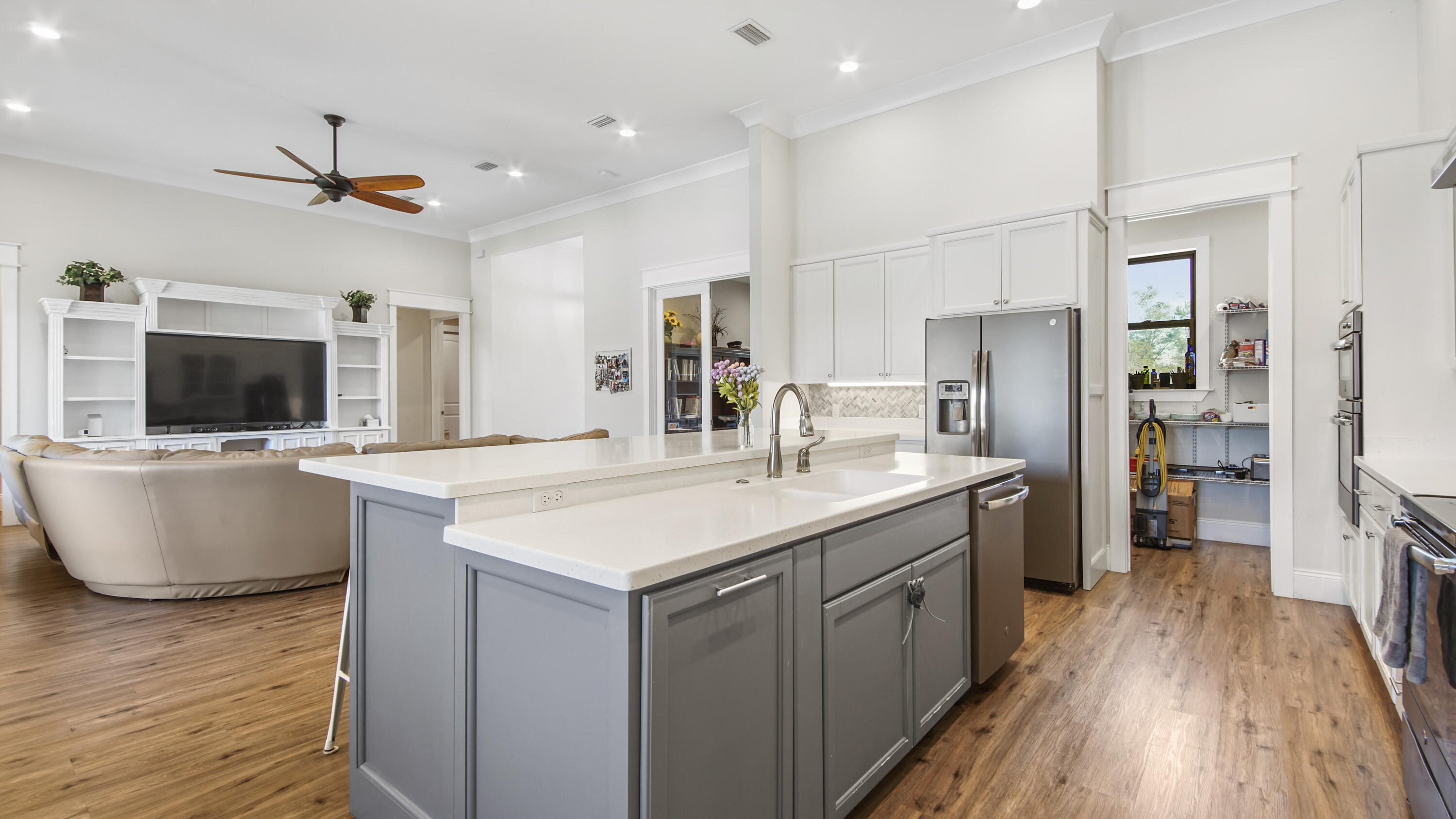 2750 Edwards Road Southport, FL 32409 - Photo 27 of 60 a kitchen with a sink and a refrigerator