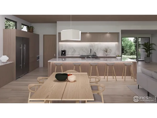 a living room with stainless steel appliances kitchen island granite countertop furniture and a large window