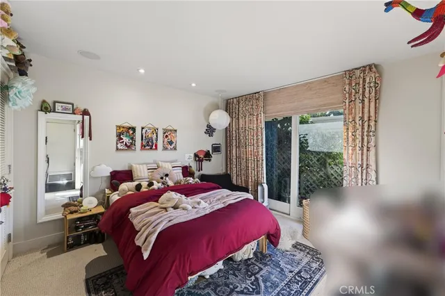 a view of a terrace with furniture and wooden floor