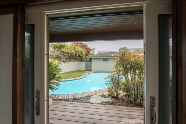 an aerial view of a house with a garden