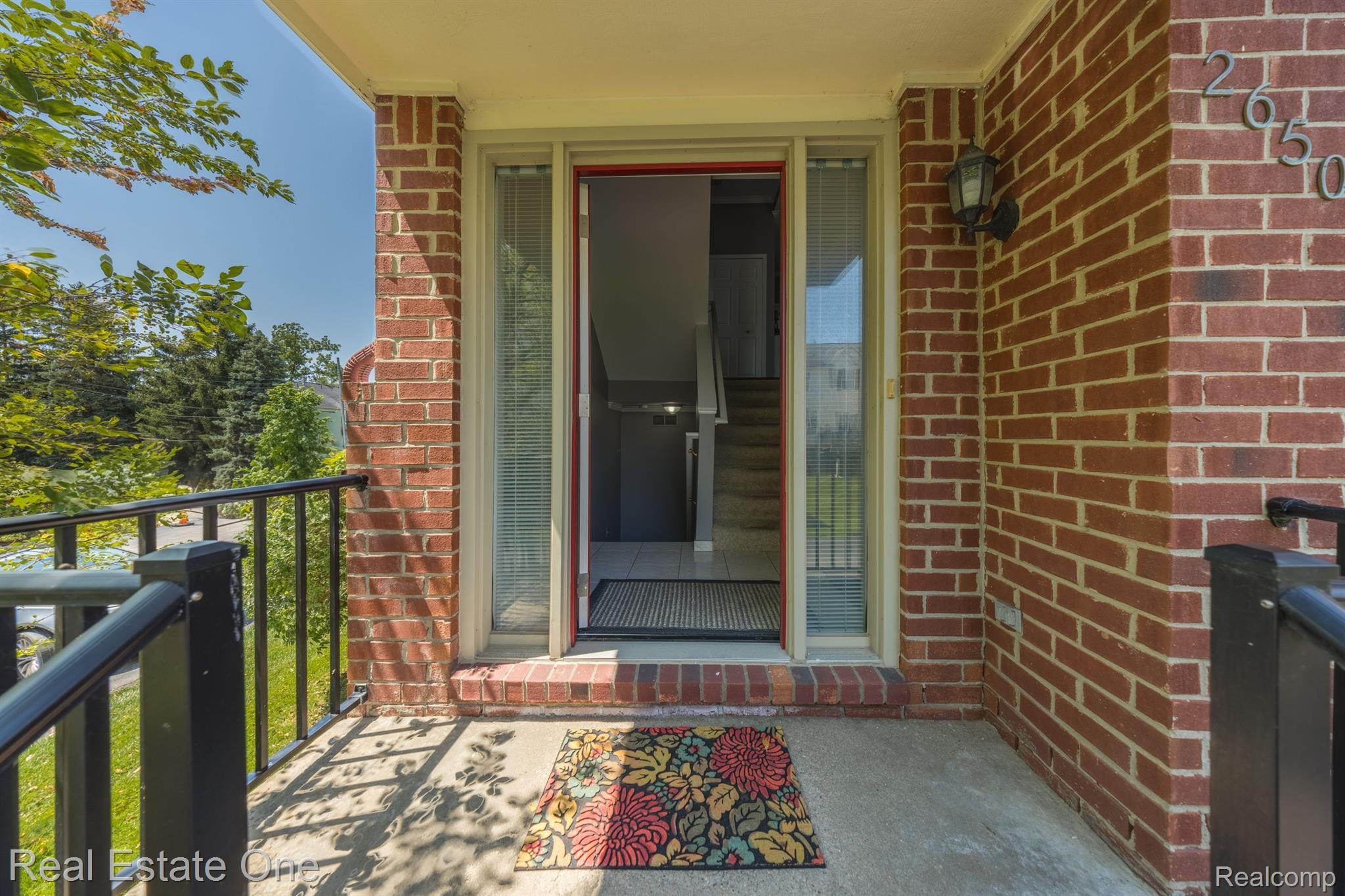2650 Crooks Road, Unit 1 Royal Oak, MI 48073 - Photo 8 of 41 Covered porch & front entrance with sidelights