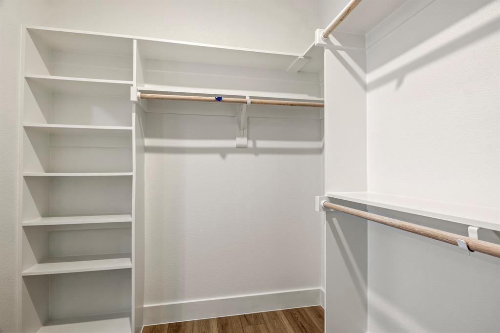 196 West 17th Street Mount Pleasant, TX 75455 - Photo 25 of 35 a view of walk in closet with empty racks