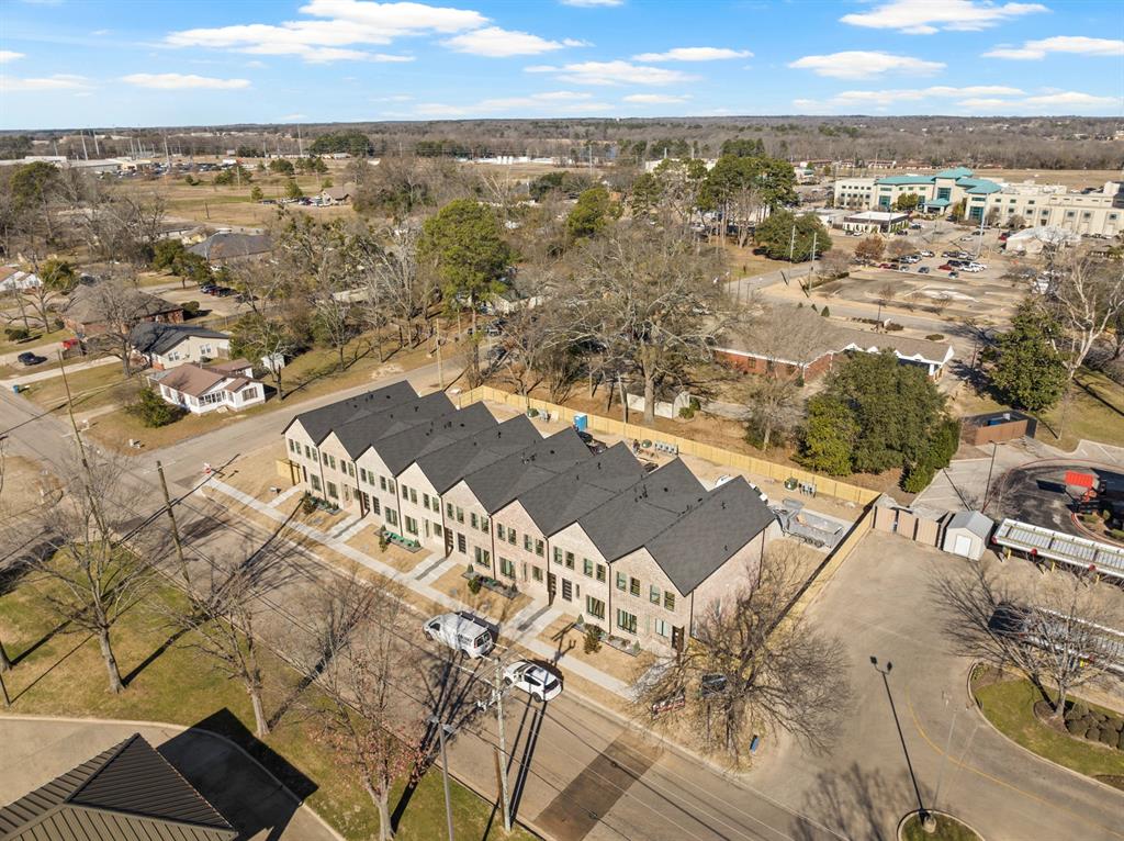 196 West 17th Street Mount Pleasant, TX 75455 - Photo 3 of 35 an aerial view of residential building with ocean view
