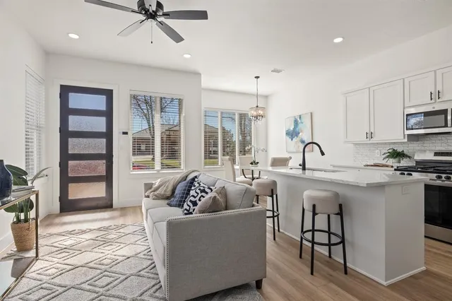 a dining room with furniture and window