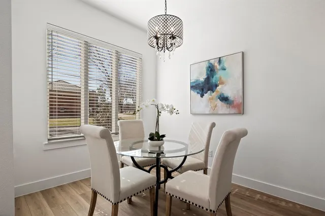 a kitchen with stainless steel appliances a sink stove and refrigerator
