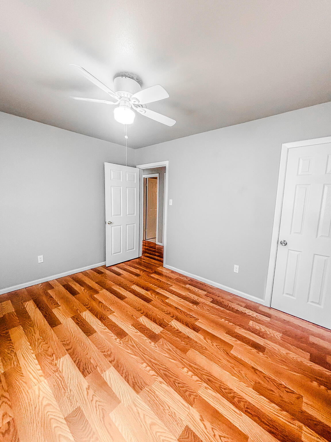 505 East 37th Street Lubbock, TX 79404 - Photo 22 of 25 a view of empty room with wooden floor