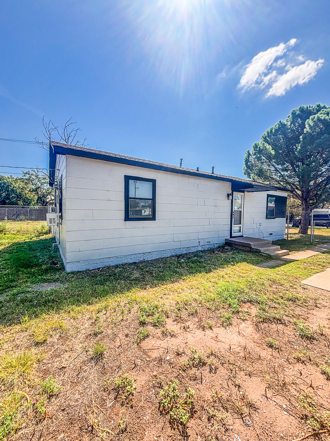505 East 37th Street Lubbock, TX 79404 - Photo 3 of 25 a view of a house with backyard and swimming pool
