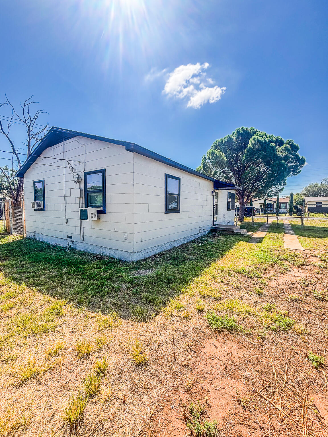 505 East 37th Street Lubbock, TX 79404 - Photo 5 of 25 a view of a house with a backyard