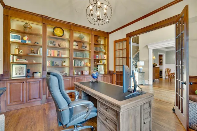a kitchen with cabinets and a stove