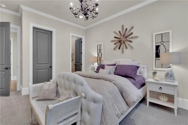 a view of a dining room with furniture wooden floor and chandelier
