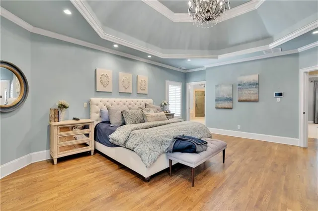 a view of a patio with a table chairs and a backyard