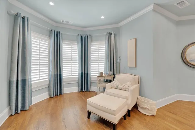 an aerial view of a house with a garden and swimming pool