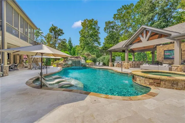 a view of room with furniture and wooden floor