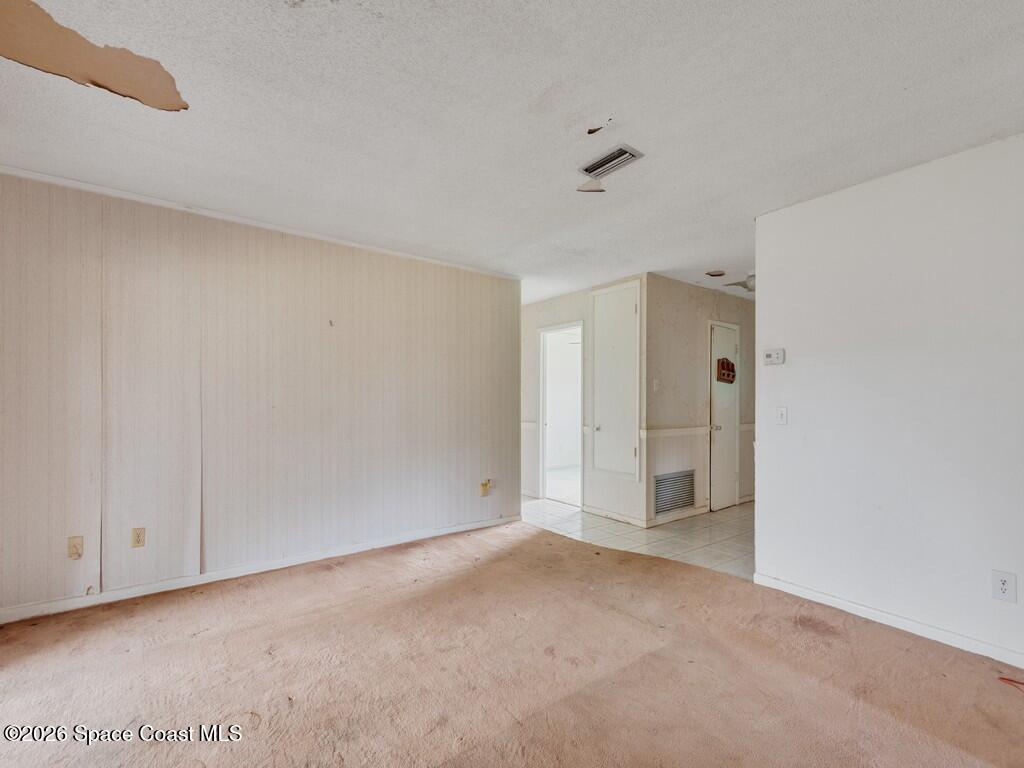 1076 Madrid Road Rockledge, FL 32955 - Photo 10 of 30 a view of an empty room